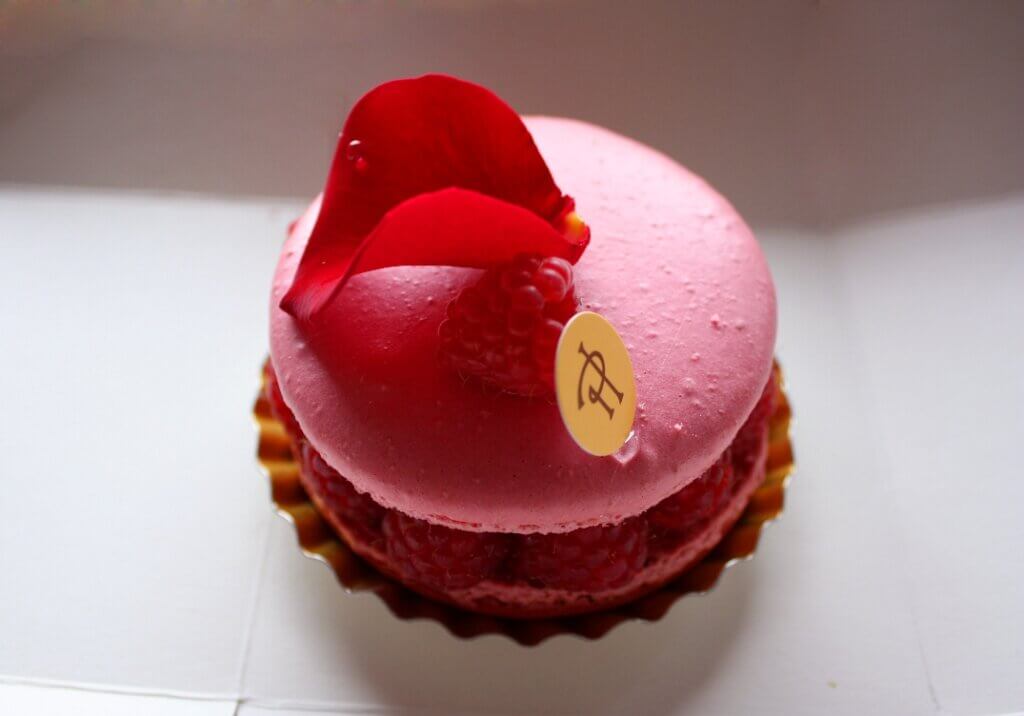 Ispahan macaroon with raspberry and petal.